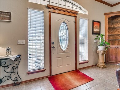 Tiled entry has plenty of natural light and featur