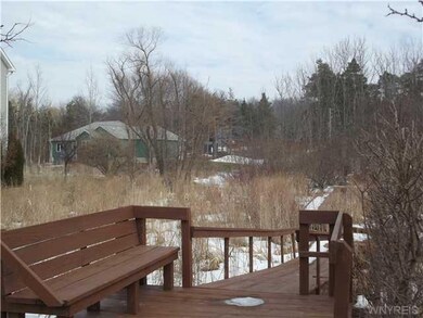 Exterior Back. Private bridge maintained by subdiv
