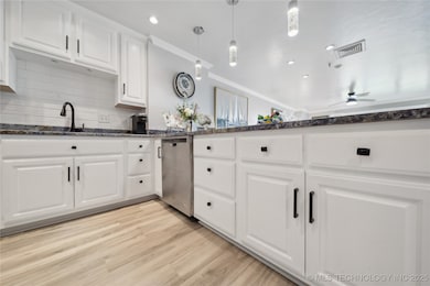 Fully remodeled kitchen featuring sleek granite co