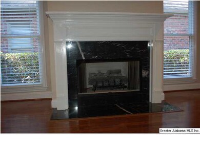 Marble fireplace in the spacious great room.