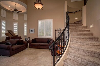 Living Room and dramatic iron staircase