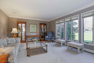 Living room. Hardwood under carpet.