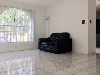 Front unit living room, window overlooks front yard.
