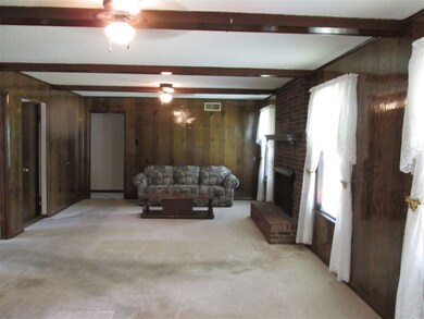 View of Den/Great Room from Laundry Room. Large op