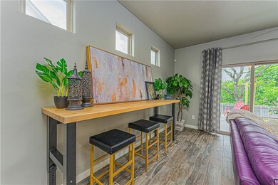 Open Concept Living Room w/ Upper Transom Windows