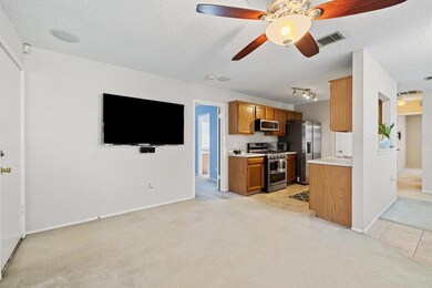 Open concept living room and kitchen.