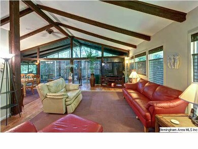Another view of living room looking out wall of wi