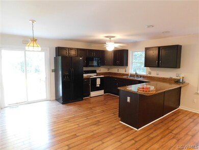 Breakfast nook with doors leading to deck