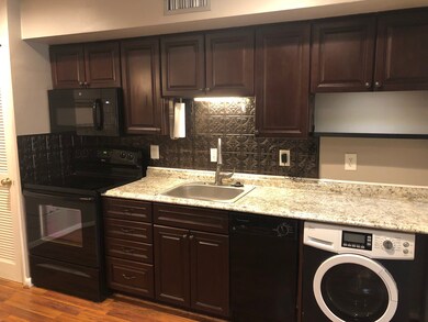Beautifully updated kitchen includes electric stov
