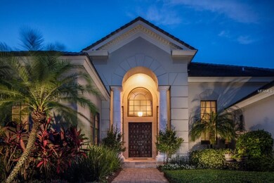 Exquisite landscaping surrounds the home, from the