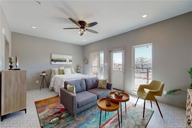 Bedroom with baseboards, access to outside, ceilin