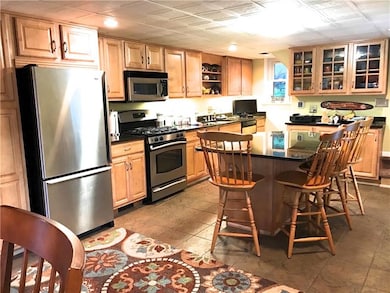 Enormous fully updated kitchen featuring granite c