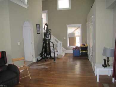 Ignore the stuff but other side of living room.