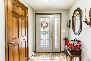  Ceramic tile flooring.  Guest closet on the left.
