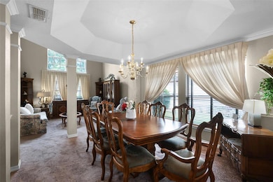 Formal dining room adjacent to kitchen