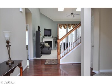 Foyer - Lots of natural light and hardwood floors 