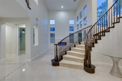 entry way into  Living Room with new quartz firepl