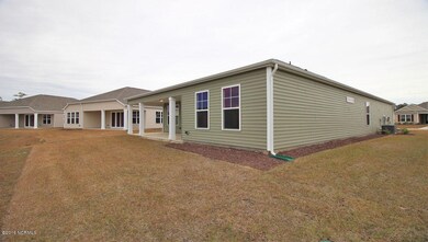 3103 Cedar Creek Ln unit Lot 311, Carolina Shores, NC 28467 - photo 2