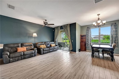 Living room featuring plenty of natural light, cei