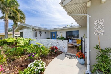 Property entrance with a patio area
