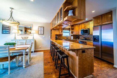 Open concept kitchen with counter space for four i