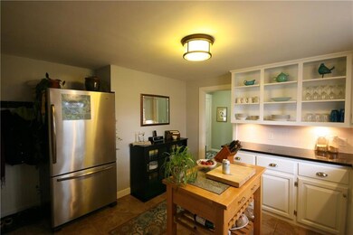 Kitchen w/open shelving-cupboard...
