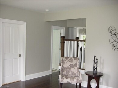 Open to the foyer is a quaint gathering space