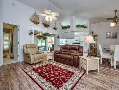 Family room with adjacent dining room