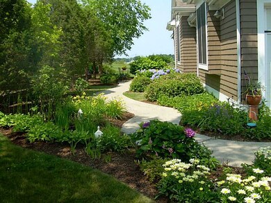 Yard/Garden. Enchanting garden welcomes your guest