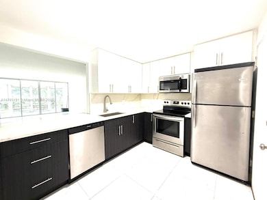 1401 NE 191st St unit D201, Miami, FL 33179 - photo 5