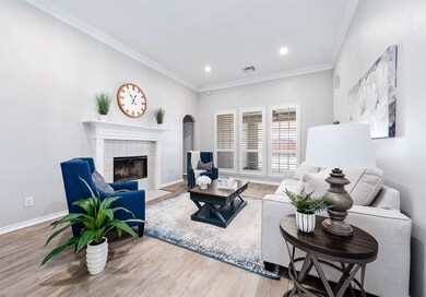 Family Room with Plantation Shutter windows and Fi
