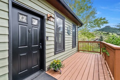 Front porch with views of Youngs Peak and the new
