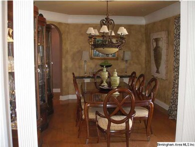 Formal dining room off the entry