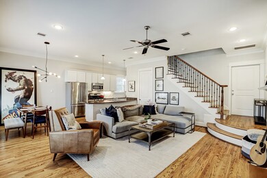 Comfortable living room with fireplace, hardwood f