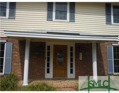 Exterior Front. Entry Door with Leaded Glass Inser