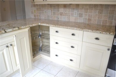 Great storage in these lazy susan corner cupboards