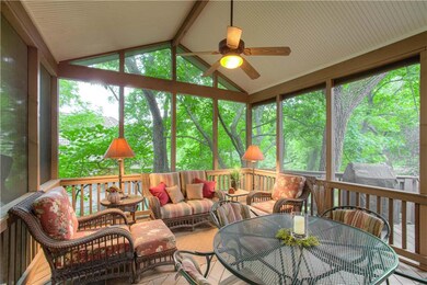 Trek floored screened porch with stairs to paver p
