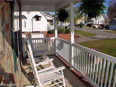 Other. Enhanced by the warm stone accent wall, this rocking chair front porch just feels like home.  You ll enjoy keeping in touch with your new community.  And the best part -- those are no maintenance vinyl posts and railings.