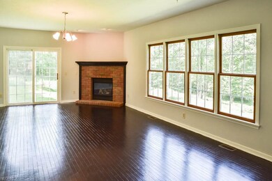Sun-filled great room with a fireplace!