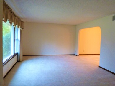 Large formal living room perfect for entertaining