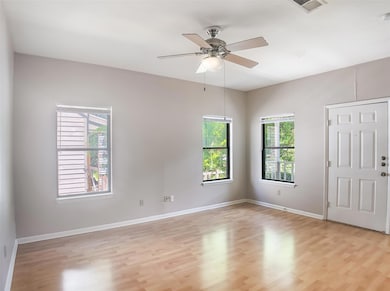 Empty room featuring light wood-style flooring, c