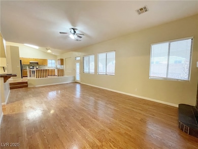 Unfurnished living room featuring light wood-style