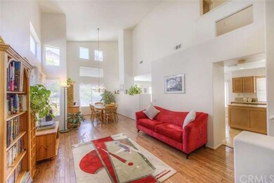 Soaring ceilings add to the home's bright and airy