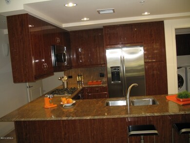 cherry burl cabinets and granite