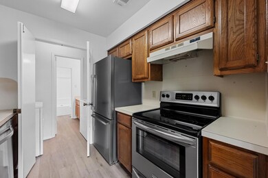 Kitchen featuring appliances with stainless steel