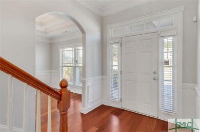 Entrance Foyer with the Dining Room on the right a