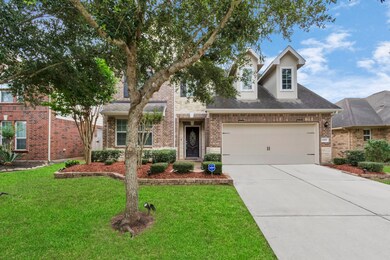 The perfect traditional elevation with stone and brick!
