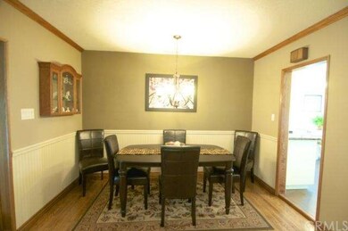 Large formal dining room adjacent to kitchen.