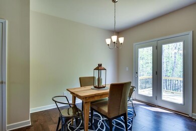 Eat in Nook with French Doors that open to back deck.