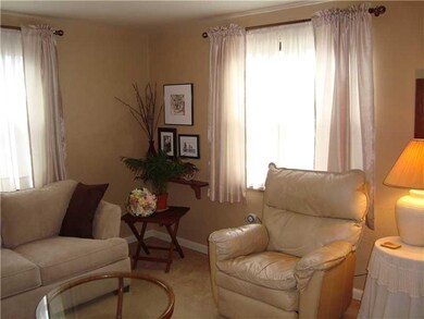 Living Room. Freshly-painted plaster walls on main